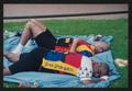 Photograph: [Two cyclists taking a lunch siesta: Lone Star Ride 2004 event photo]