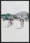 Photograph: [Two cyclists in a rest stop parking lot: Lone Star Ride 2004 event p…
