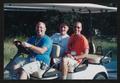 Primary view of [Three crew members sitting in a golf cart: Lone Star Ride 2002 event photo]
