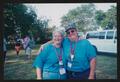 Photograph: [Individuals in blue hugging: Lone Star Ride 2004 event photo]