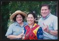 Thumbnail image of item number 1 in: '[Family of three posing with cyclist daughter: Lone Star Ride 2004 event photo]'.