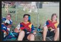 Photograph: [Lounging and smiling cyclists: Lone Star Ride 2004 event photo]
