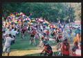 Photograph: [Cyclists crossing the finish line to a cheering crowd: Lone Star Rid…