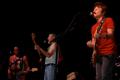 Thumbnail image of item number 1 in: '[Tom Johnston, Patrick Simmons, and Tiran Porter on stage]'.