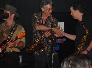 Primary view of object titled '[Saxophonists shake hands at Vicky G. Moerbe tribute concert]'.