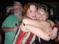 Photograph: [Vicky Moerbe hugs woman 2 at tribute concert]