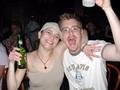 Thumbnail image of item number 1 in: '[Man and woman pose with drinks at Vicky G. Moerbe tribute concert]'.