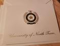 Photograph: [University of North Texas Class of 2021 graduation invitation card]