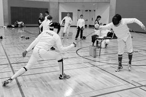 Primary view of object titled '[UNTFC member lunges at opponent]'.