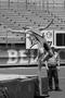 Primary view of [Mark Lee performs high jump at Brooks/NT Spring Classic, 1]