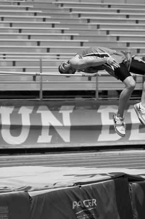 Primary view of object titled '[Toby Edwards performs high jump at Brooks/NT Spring Classic, closeup]'.