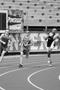 Thumbnail image of item number 1 in: '[Johnny Quinn and opponents compete in 200 meter dash, 2]'.