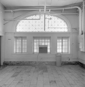Primary view of object titled '[Photograph of a building with four windows #1]'.