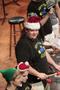 Photograph: [Drummer wearing a Santa hat at the Percussion Holiday Performance]