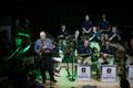 Primary view of [Aerial view of saxophone and trumpet players at the Jazz Ambassadors Syndicate Performance]