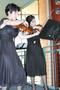 Photograph: [Two violinists at the Jake Heggie camerata reception and dinner]