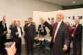 Photograph: [James Scott toasting and raising his glass at the Jake Heggie post-c…
