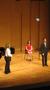 Photograph: [Three singers on stage at the Student recital during Jake Heggie's r…