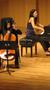 Photograph: [Cello, piano, and singer performance at the Student recital during J…