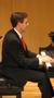 Photograph: [Close-up of Heggie playing piano, Student recital during Jake Heggie…