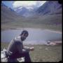 Photograph: [Ruben sitting with the Aconcagua mountain in the distance]