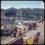 Photograph: [People standing next to boats in Puerto Montt and Angelmó]