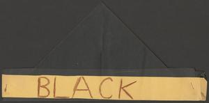 Primary view of object titled '[A black paper hat]'.