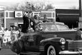 Photograph: [Norval Pohl rides in 2005 Homecoming Parade]