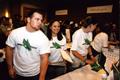 Thumbnail image of item number 1 in: '[Student volunteers pass out items at UNT rebrand unveiling]'.