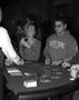 Photograph: [Students play baccarat at Casino Night]