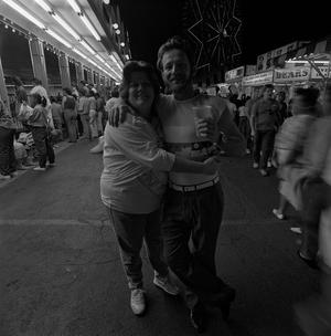 Primary view of object titled '[Photograph of a couple at the state fair]'.
