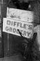 Photograph: [A Biffle's Grocery sign]