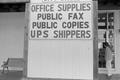 Photograph: [A sign for an office supplies store]