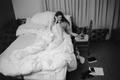 Photograph: [A woman laying in bed, 2]