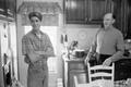 Photograph: [Dustin and Jesse Hall in a kitchen]