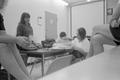 Photograph: [Individuals in a classroom, 1]