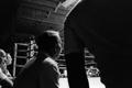 Photograph: [A man sitting near a boxing ring]