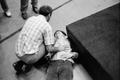 Photograph: [Atlanta man lies on floor during church service]