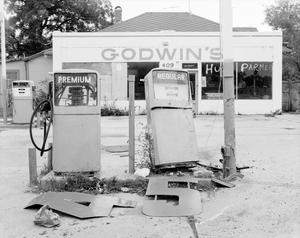 Primary view of object titled '[An abandoned gas station called Godwin's]'.