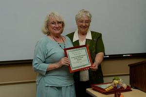 Primary view of object titled '[Elsie Wiley presents award to Travis County program]'.
