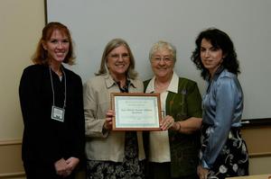Primary view of object titled '[Elsie Wiley presents award to Fort Worth Senior Citizen Services]'.