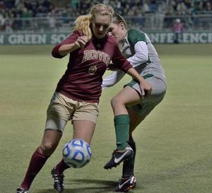 Primary view of object titled '[Shannon Gorrie plays defense during Denver game, 1]'.