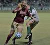 Photograph: [Shannon Gorrie plays defense during Denver game, 1]