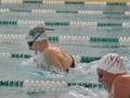 Thumbnail image of item number 1 in: '[UNT and NMSU competitors race in breaststroke event]'.