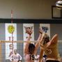 Thumbnail image of item number 1 in: '[Brittani Youman attempts to block spike by Yarimar Rosa]'.