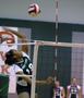 Primary view of [Brittani Youman spikes volleyball]
