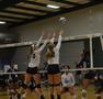Photograph: [Holly Milam and Amy Henard attempt to block during JSU match]