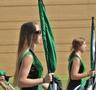 Primary view of [Green Brigade Color Guard walks 2011 Homecoming Parade]