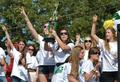 Photograph: [Sorority members pose with trophy at 2011 Homecoming Parade]