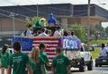 Photograph: [Kappa Sigma-Alpha Phi joint float at 2011 Homecoming Parade]